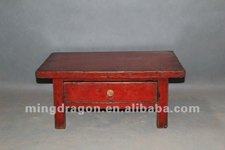 Table basse en bois rouge